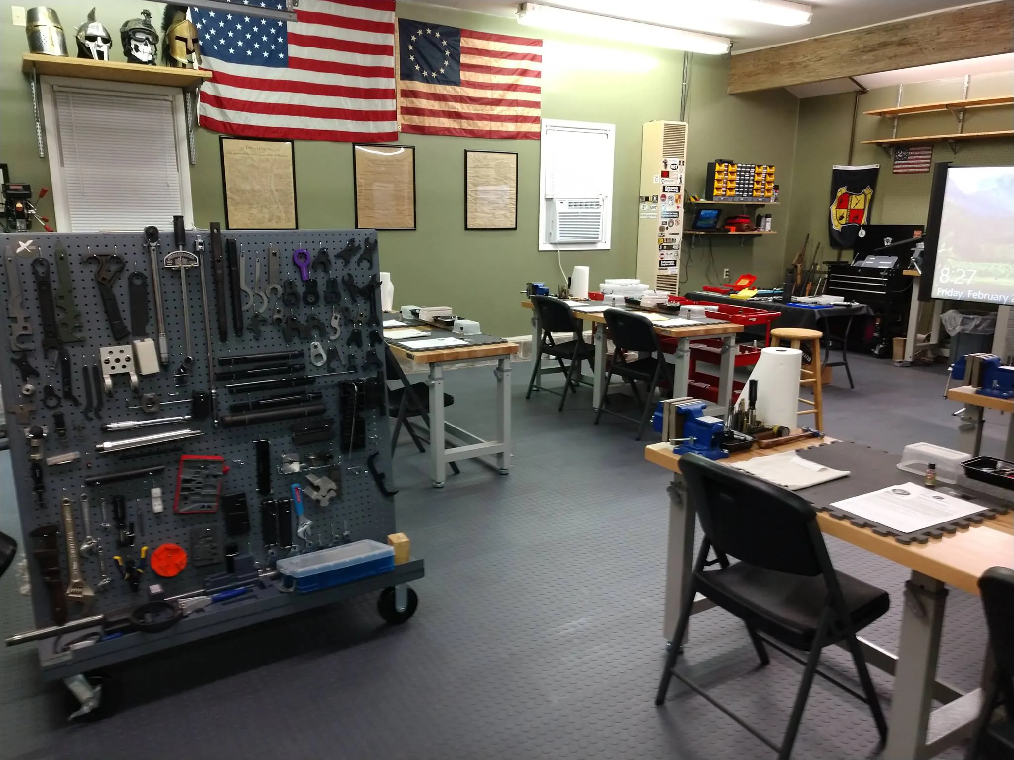 A room full of tools and equipment in a workshop.