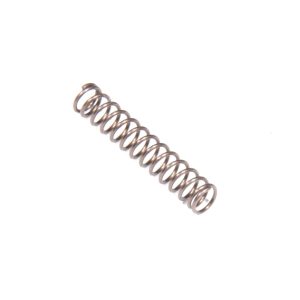 A close-up of an AR15 Buffer Detent Spring, coiled and isolated on a white background.