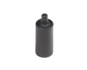 A compact, black, cylindrical AR15 Buffer Detent Spring end cap featuring a rounded top.