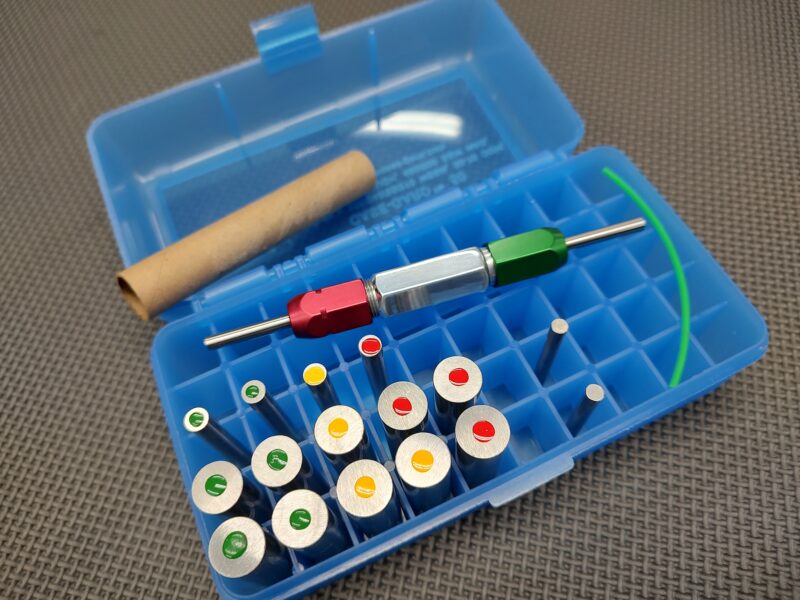 A blue SOTAR BCG 3 Bore & Gas System Gauge Set box containing a set of different colored tools.