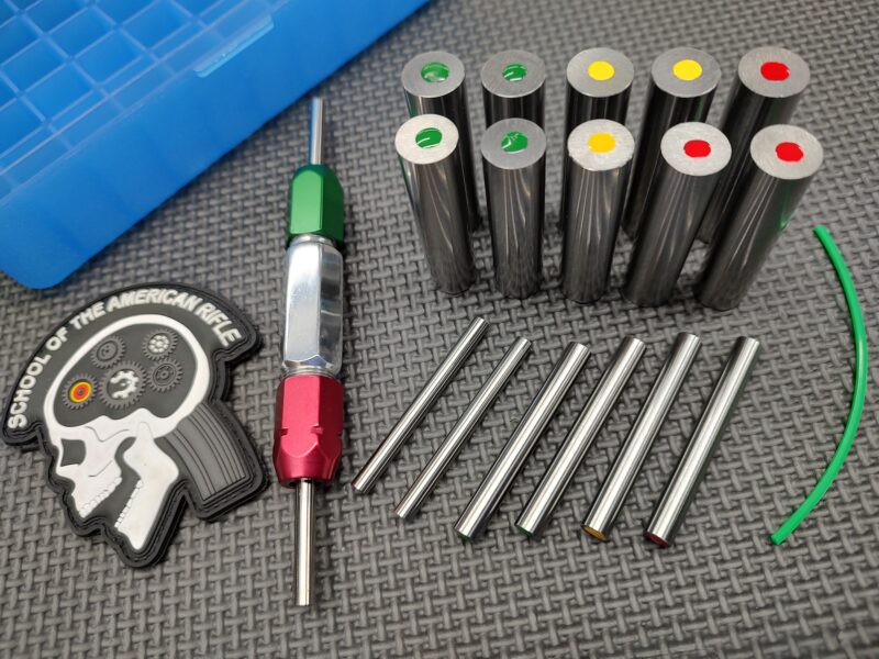 A group of SOTAR BCG 3 Bore & Gas System Gauge Set with different colored ends.