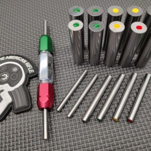 A SOTAR BCG 3 Bore & Gas System Gauge Set of metal rods and a set of colored pins.