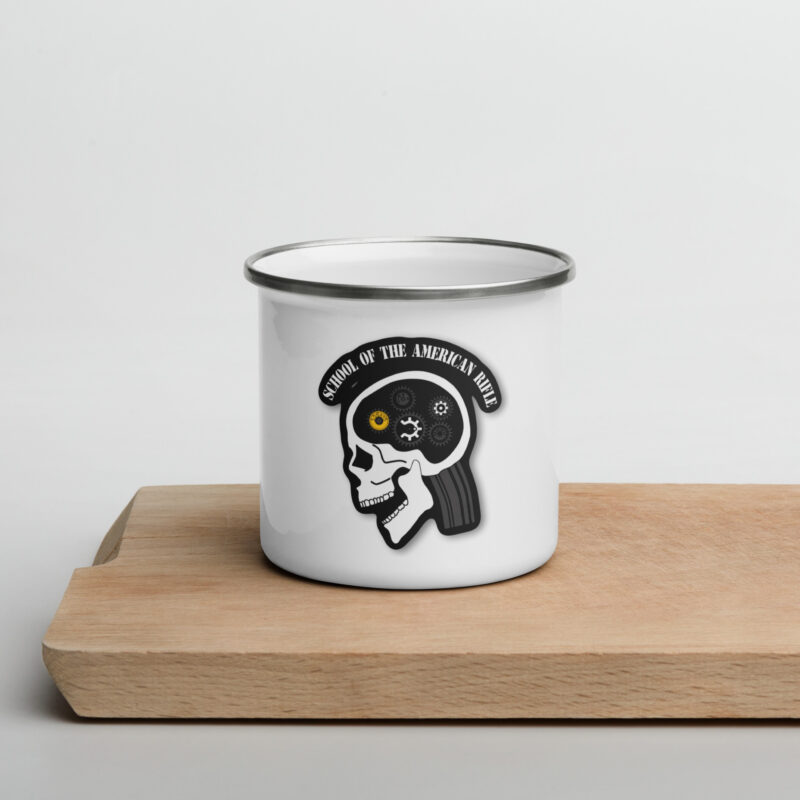 A SOTAR enamel mug with a skull on it.